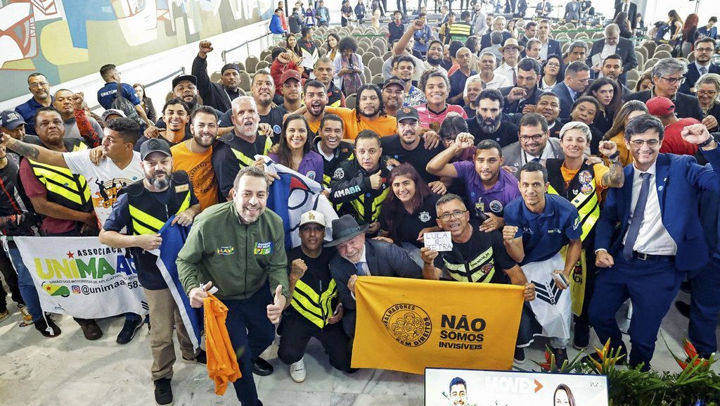 Termina dia 30 prazo para fazer contribuições ao programa de governo do PT 3 entregadores-de-app-podem-financiar-novas-motos-eletricas-move-brasil-entregadores-e-motoapp-programa-de-financiamento-especial-voltado-a-profissionais-que-trabalham-com-entregas-de-mercadorias-transporte-de-passageiros-ou-transporte-de-cargas-por-meio-de-aplicativos-ou-com-vinculo-celetista-tvt-news